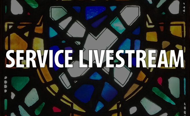 Shield of Saint Andrew in stained glass with the text overlay 'Service Livestream'